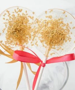 She She Boutique Gold Sparkle Lollipop - Black Cherry Flavor